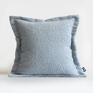 Kissen Boucle Hellblau mit Rand